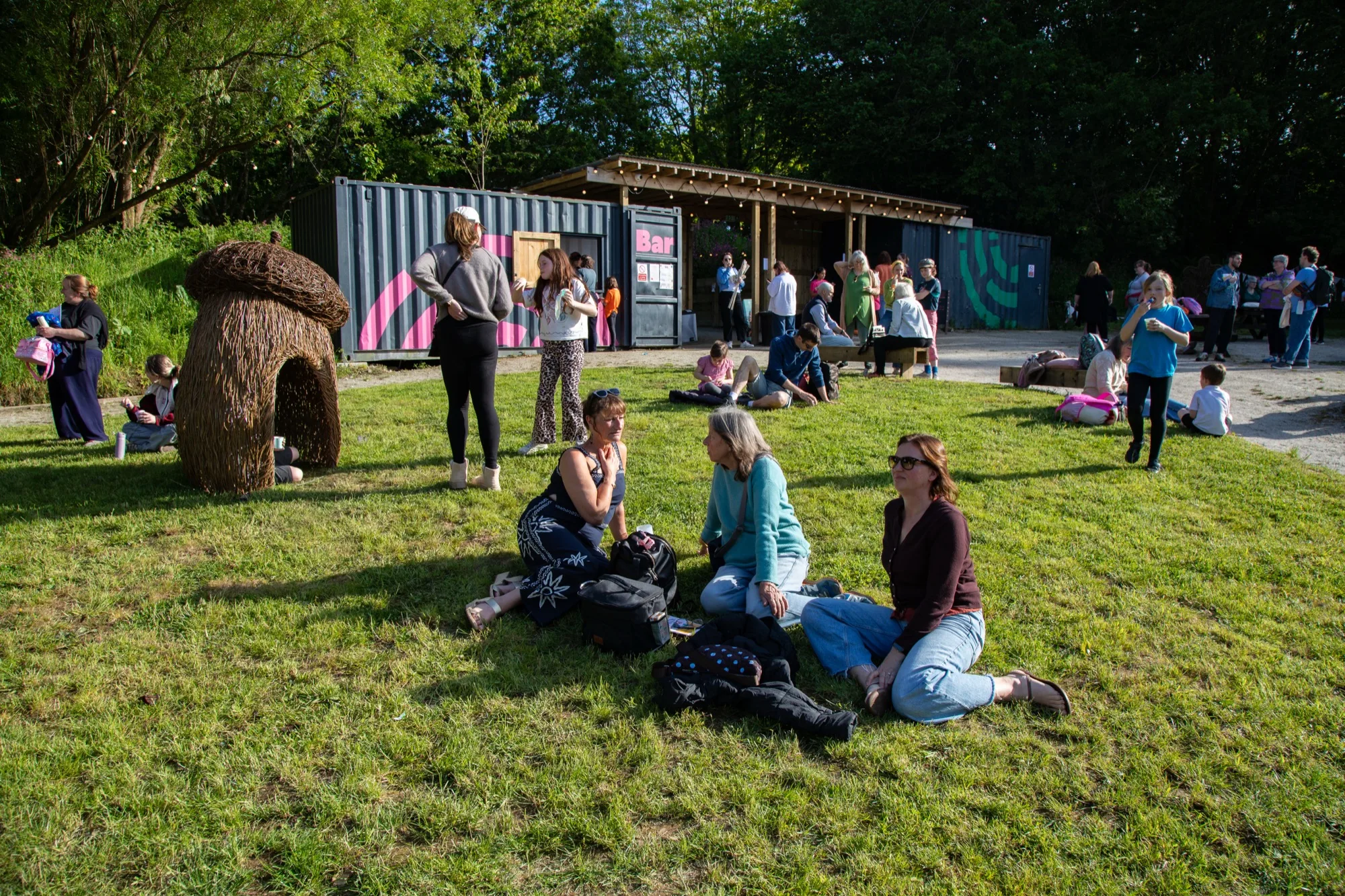 Visitors gathered at the Sterts bar in the evening light